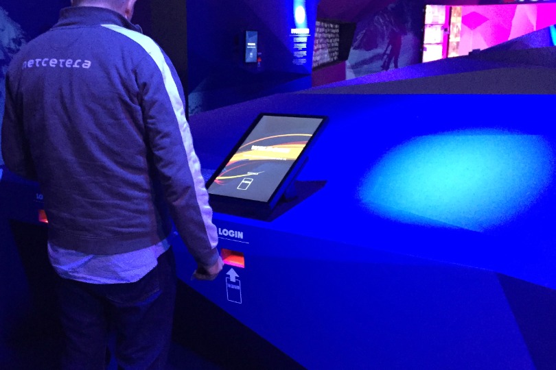 Loging in to the app via touch screen at the entrance